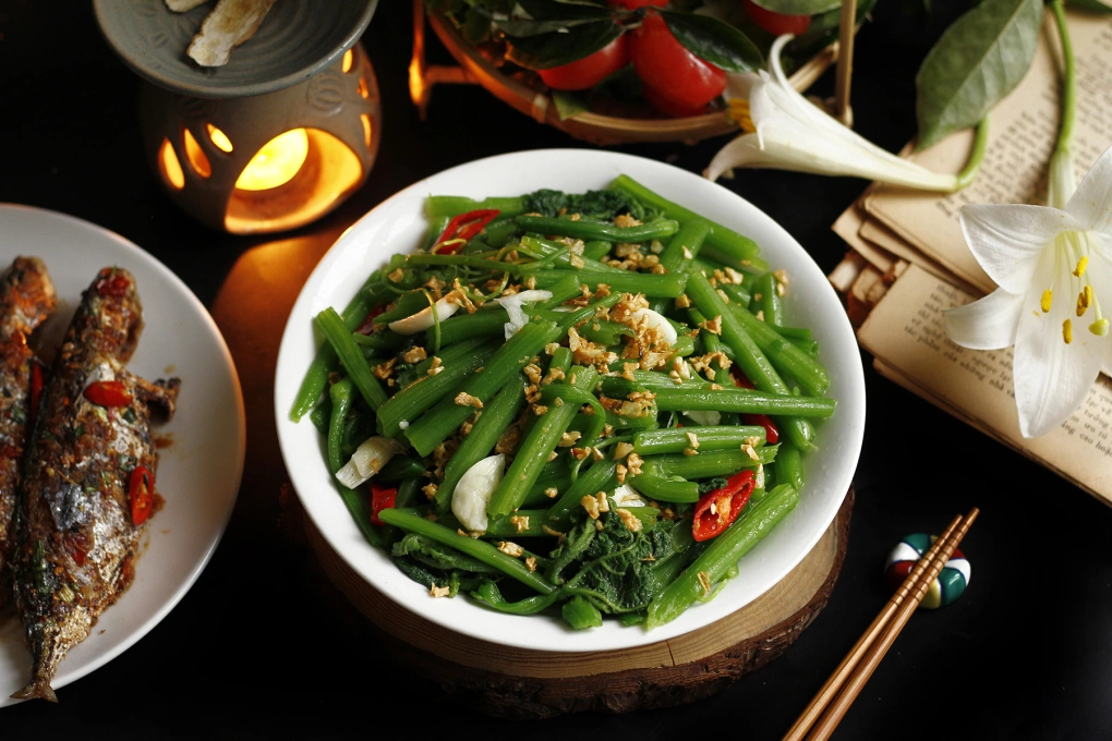 Rau bí xào tỏi, một món ăn nhiều người ưa thích. Ảnh: Bùi Thủy